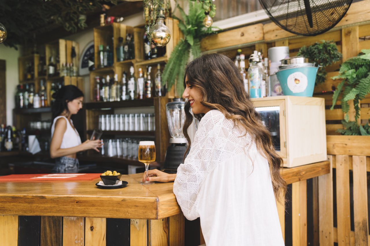 Woman with beer bar